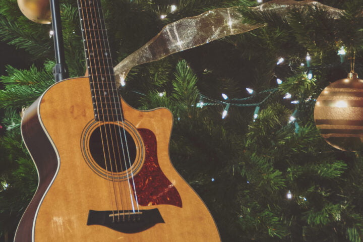 Guitar next to Christmas Tree